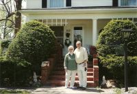Glen and Lucy Sullivan in front of their house